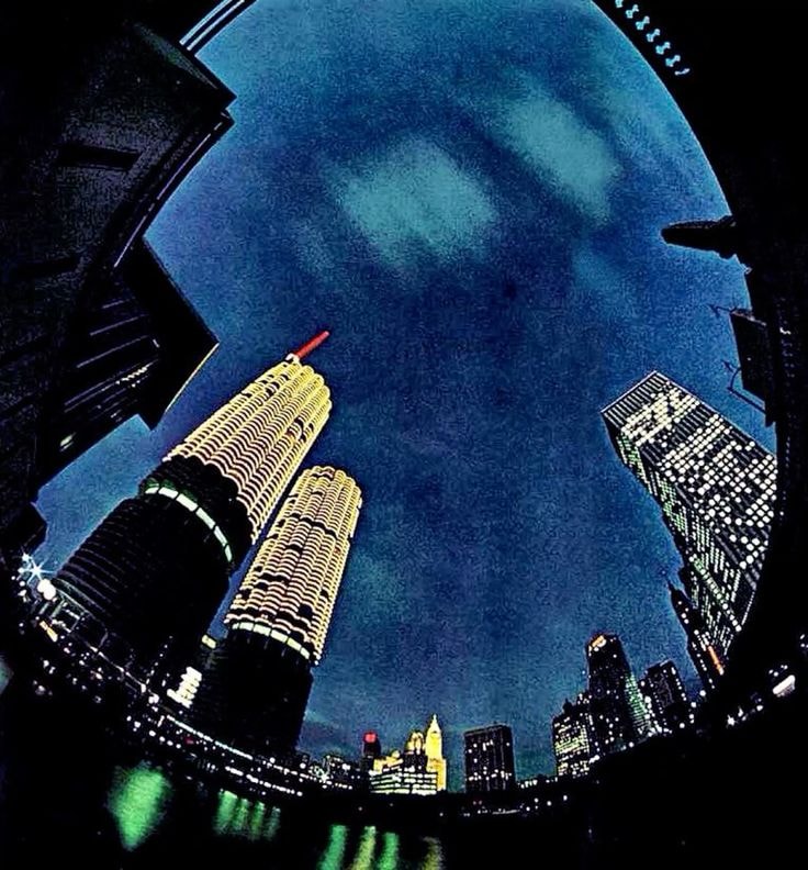 Stylized blue duotone portrait of a woman with long hair facing slightly backward